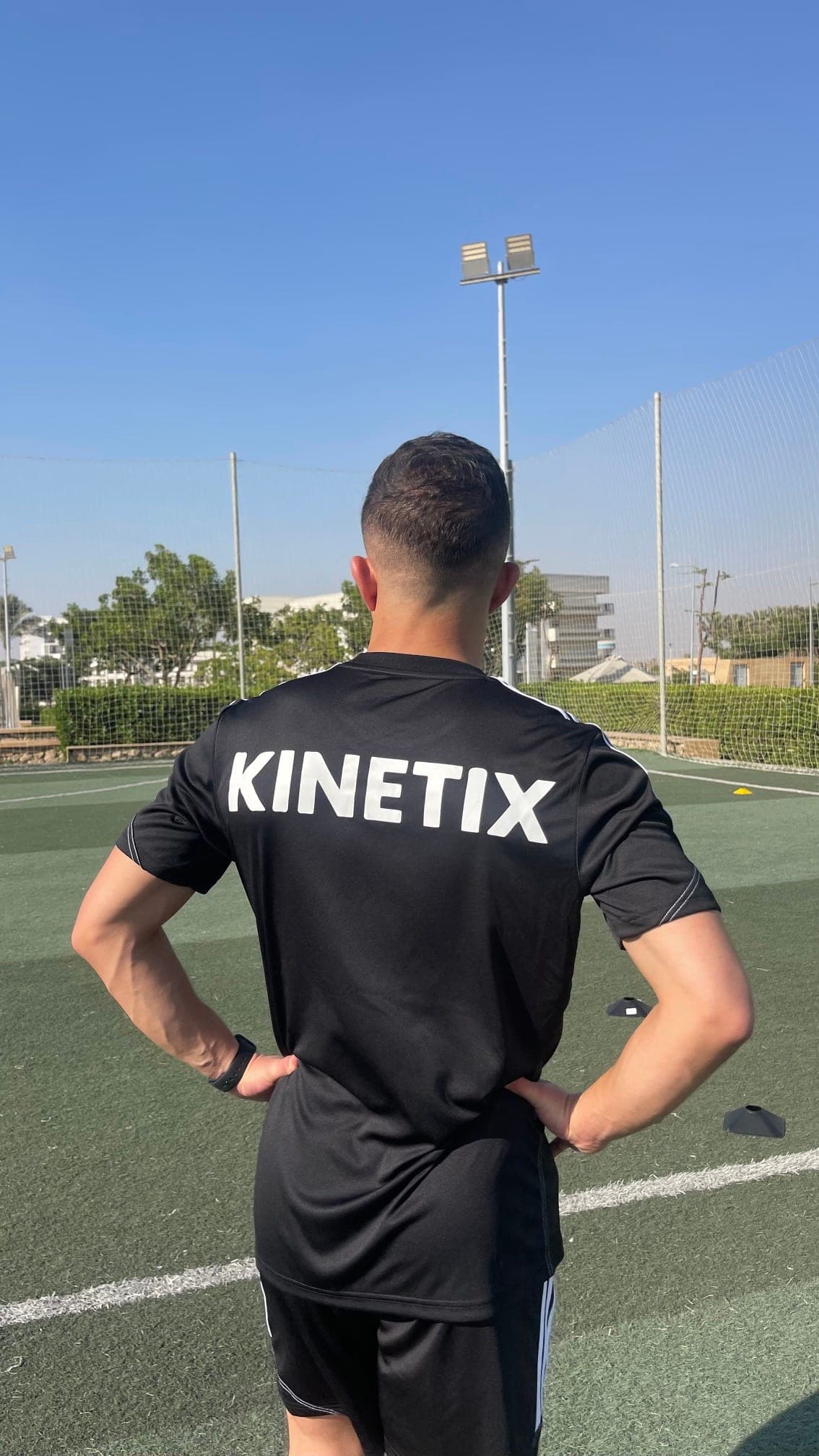 Kinetix coach on the pitch